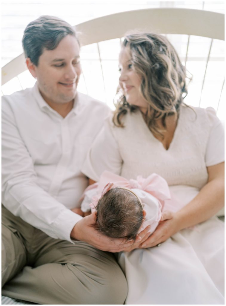 Alpharetta Newborn Photographer Grace Emily documents a mother, father, and new baby with newborn photos.