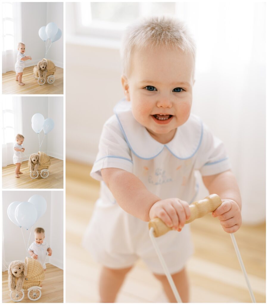 Four images of a baby boy wearing a white outfit that says "big brother". He is pushing a brown wicker baby buggy. The buggy has three light blue balloons tied to the top.  